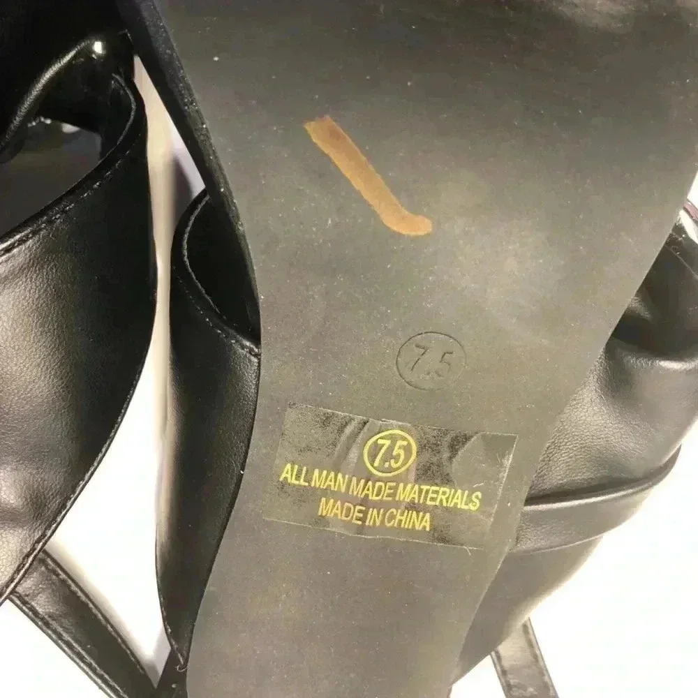 Black and silver heels size 7.5